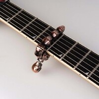 Guitto GGC-05-BR Skull Guitar Capo - Bronze